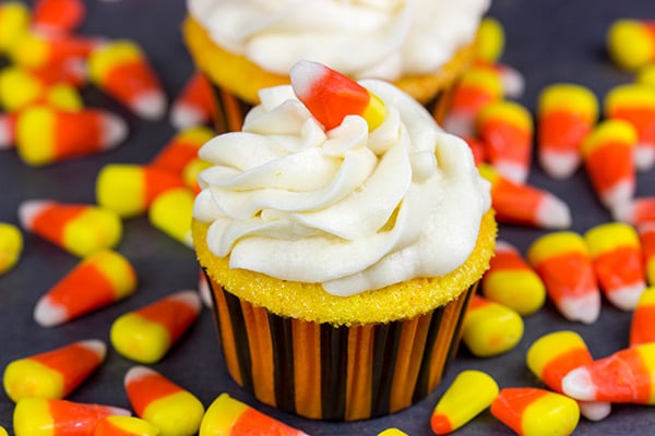 A bit of yellow and orange food coloring turns these classic vanilla cupcakes into Candy Corn Cupcakes. They're perfect for Halloween!