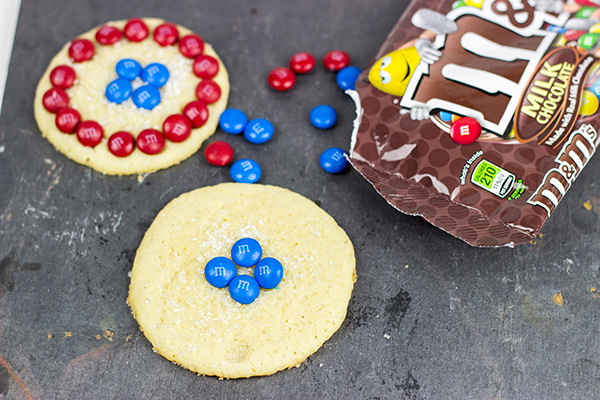 Inspired by Captain America's shield, these classic sugar cookies are decorated with M&Ms to create a tasty treat! #HeroesEatMMs #shop