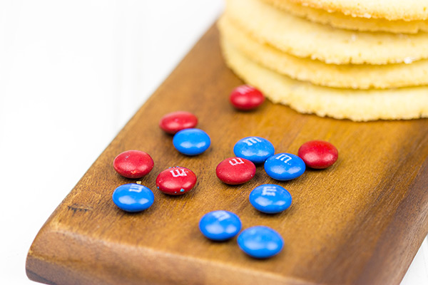 Inspired by Captain America's shield, these classic sugar cookies are decorated with M&Ms to create a tasty treat! #HeroesEatMMs #shop