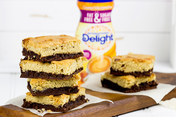 Is it a brownie? Is it a blondie? No, it's both! These Caramel Marshmallow Brownie Bars are a delicious combination of caramel, marshmallow and chocolate!