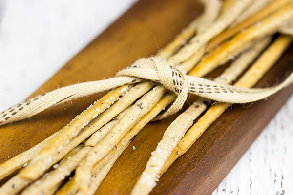 These Kalamata Olive and Sea Salt Grissini (i.e. breadsticks) are the perfect pre-dinner appetizer!