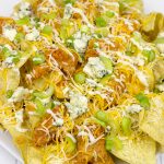 These Buffalo Chicken Ranch Nachos feature everything you love about buffalo wings…just in nacho form! They're the perfect appetizer for the big game!