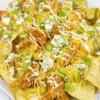 These Buffalo Chicken Ranch Nachos feature everything you love about buffalo wings…just in nacho form! They're the perfect appetizer for the big game!