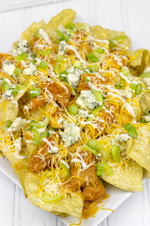 These Buffalo Chicken Ranch Nachos feature everything you love about buffalo wings…just in nacho form! They're the perfect appetizer for the big game!