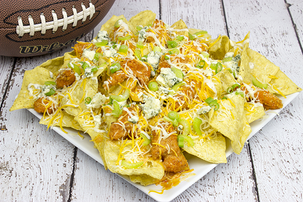 These Buffalo Chicken Ranch Nachos feature everything you love about buffalo wings…just in nacho form! They're the perfect appetizer for the big game!