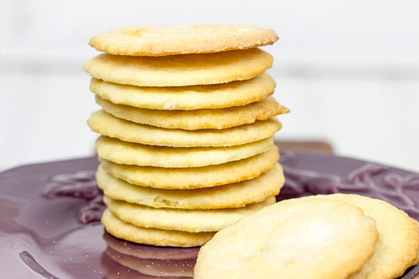 These Eggnog Ice Cream Sandwiches just like your favorite holiday drink...just in ice cream form and stuffed between thin, crispy cookies!