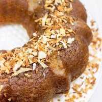 Soaked overnight in dark rum and then topped with toasted coconut, this Toasted Coconut Rum Cake is a great way to celebrate the holidays!