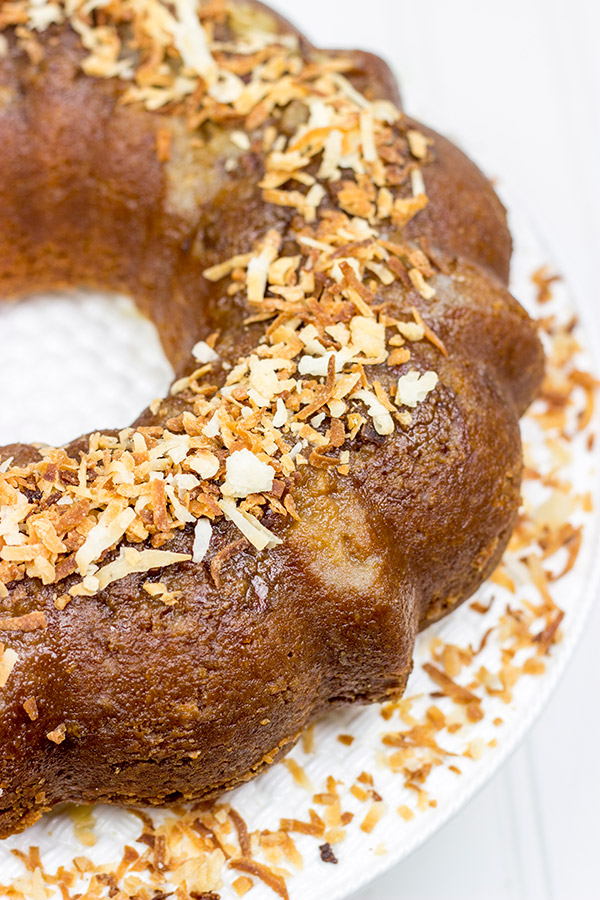 Soaked overnight in dark rum and then topped with toasted coconut, this Toasted Coconut Rum Cake is a great way to celebrate the holidays!