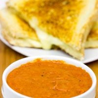 This Tomato Grilled Cheese Soup is what happens when tomato soup meets a grilled cheese sandwich. It's the ultimate comfort food, and it's guaranteed to warm you up on a cold winter day!