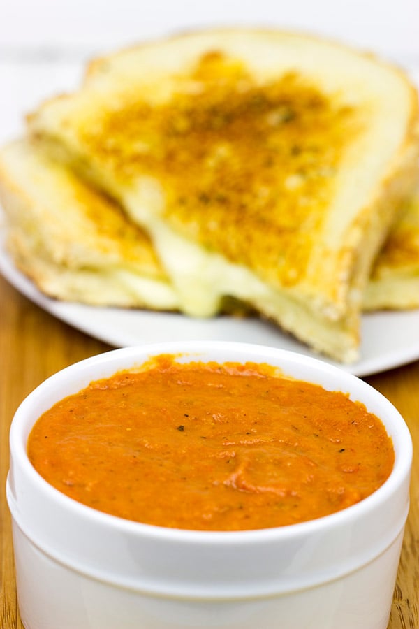 This Tomato Grilled Cheese Soup is what happens when tomato soup meets a grilled cheese sandwich. It's the ultimate comfort food, and it's guaranteed to warm you up on a cold winter day!