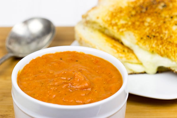 This Tomato Grilled Cheese Soup is what happens when tomato soup meets a grilled cheese sandwich. It's the ultimate comfort food, and it's guaranteed to warm you up on a cold winter day!