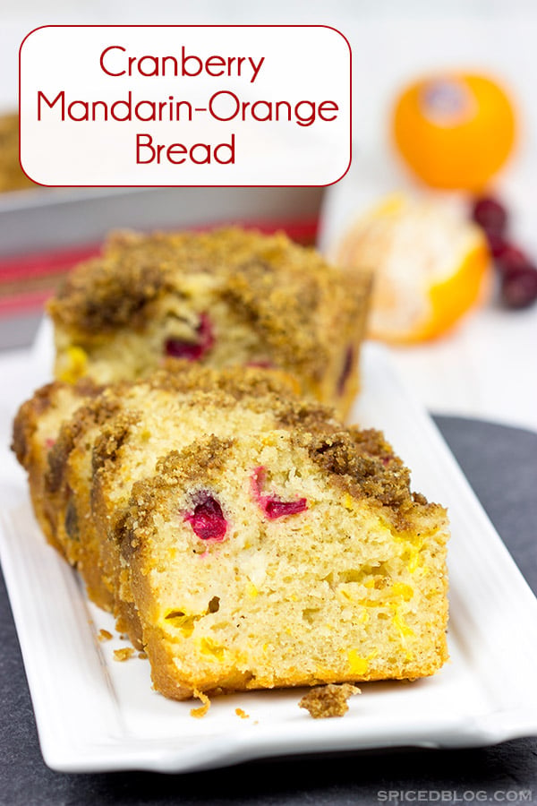 Loaded with cranberries and mandarin oranges and topped with a graham cracker crumble, this tasty Cranberry Mandarin Orange Bread is perfect for holiday baking!