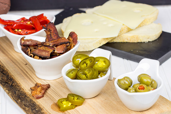 Be the MVP of your party with this fun and delicious Grilled Cheese Bar! Get creative with the ingredients, let your guests build their own sandwiches and then award prizes for the more unique sandwiches.