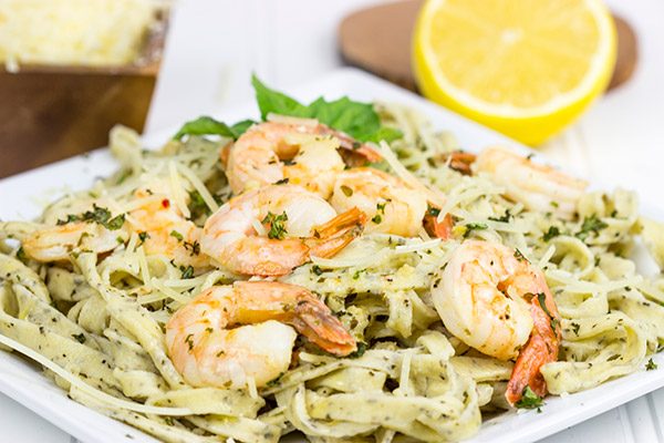 Pull out that pasta maker and make some homemade Basil Garlic Fettuccine. Top it with Lemon Garlic Shrimp for an easy date-night at home meal!
