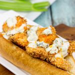 These delicious Buffalo Chicken Hoagies feature baked chicken coated in crispy breadcrumbs and tangy, homemade Buffalo sauce. They're the perfect sandwich for the big game!