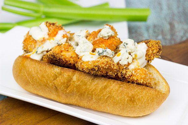 These delicious Buffalo Chicken Hoagies feature baked chicken coated in crispy breadcrumbs and tangy, homemade Buffalo sauce. They're the perfect sandwich for the big game!
