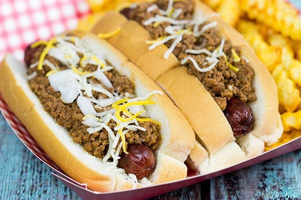 Featuring a splash of bourbon (yes, bourbon!), these Chili Cheese Dogs are a classic comfort food...perfect for snacking on during sporting events! 