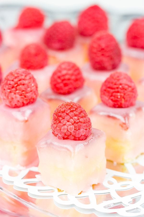 These Raspberry Almond Petit Fours feature layers of decadent almond cake, silky French buttercream and raspberry jam. They're the perfect one-bite sweet treat for your next big party!