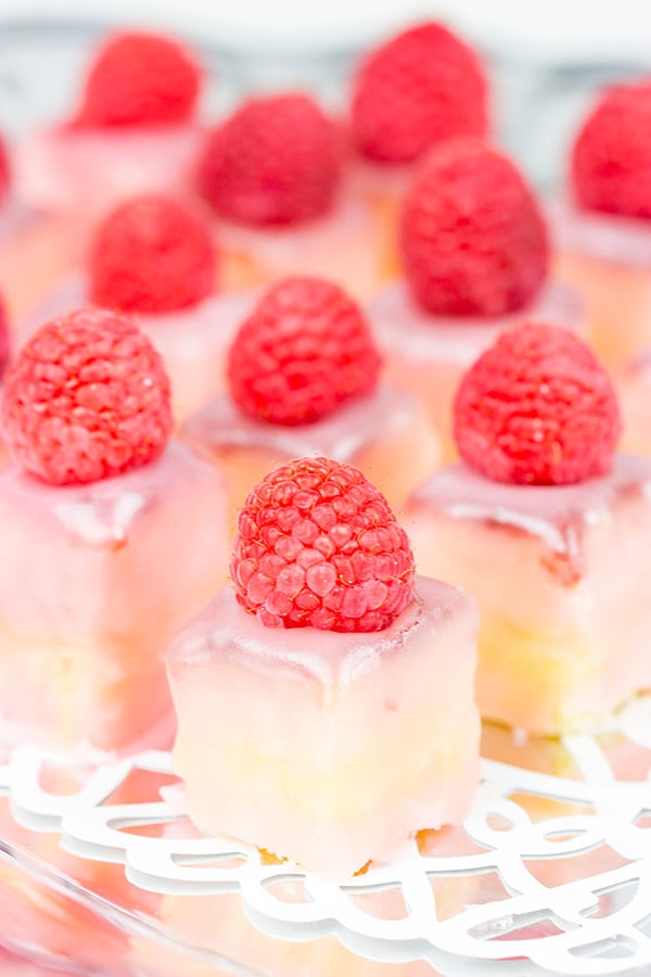 These Raspberry Almond Petit Fours feature layers of decadent almond cake, silky French buttercream and raspberry jam. They're the perfect one-bite sweet treat for your next big party!