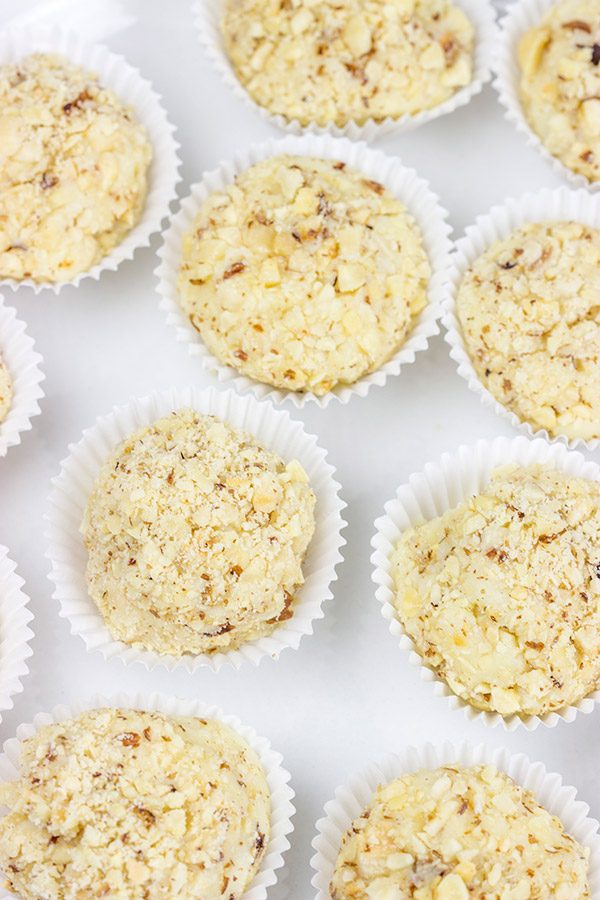 Packed with flavor and then rolled in chopped hazelnuts, these White Chocolate Hazelnut Truffles are a fun sweet treat to serve at your next party!