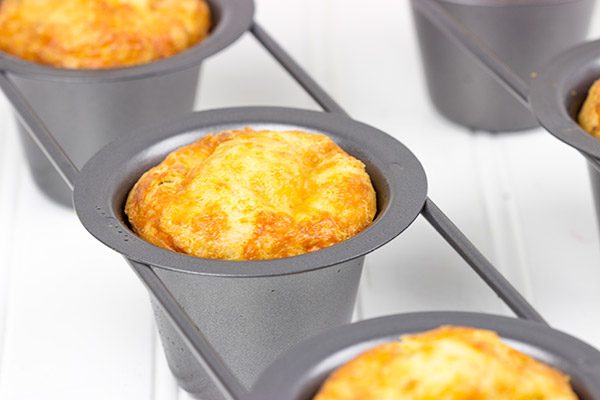 Filled with extra-sharp cheddar cheese and crumbled bacon, these Bacon Cheddar Popovers are perfect for a hearty weekend brunch!