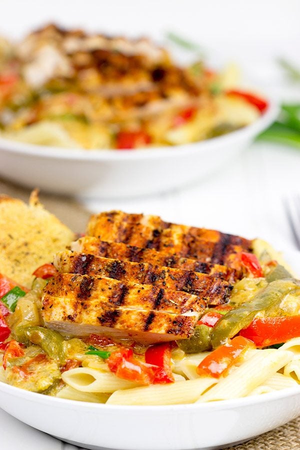 Celebrate Mardi Gras with some delicious Cajun food! This Cajun Chicken Pasta is one of our favorites! Celebrate Mardi Gras with some delicious Cajun food! This Cajun Chicken Pasta is one of our favorites!
