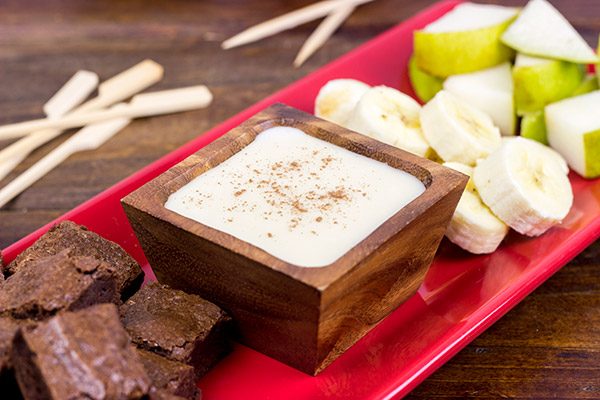 Fondue is making a comeback...starting with dessert! These Brownie Bites with French Vanilla Dipping Sauce are a fun and tasty treat!