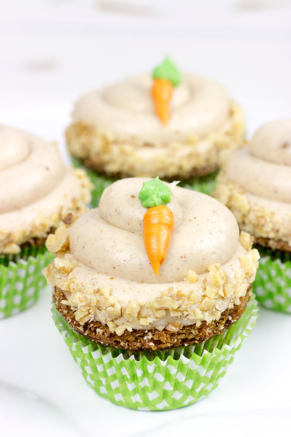 The Easter Bunny stopped by with a batch of these tasty Carrot Cake Cupcakes. Topped with brown sugar cream cheese frosting, these cupcakes will be a huge hit in your house!
