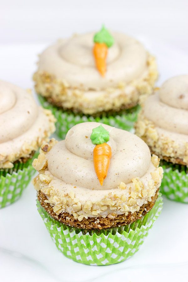The Easter Bunny stopped by with a batch of these tasty Carrot Cake Cupcakes. Topped with brown sugar cream cheese frosting, these cupcakes will be a huge hit in your house!