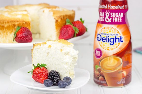 Grab some fresh berries and serve them up a slice of this light and airy Hazelnut Angel Food Cake!