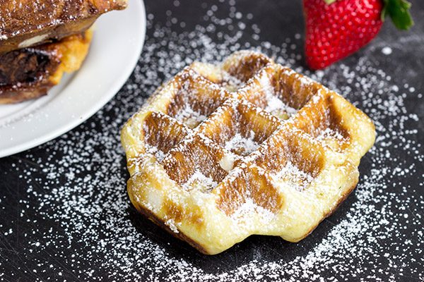 Have you ever tried a Liege Waffle? This classic Belgian street food features chunks of pearl sugar baked inside of a yeasted dough...and it's delicious!