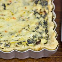 Turn one of your favorite dips into an entree with this tasty Spinach Artichoke Tart!
