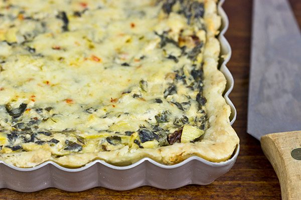 Turn one of your favorite dips into an entree with this tasty Spinach Artichoke Tart!