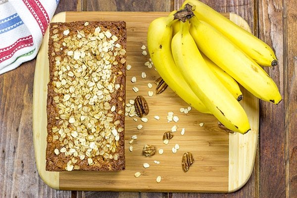 The addition of oats into this classic banana bread recipe yields a delicious Banana Oat Bread that will leave you begging for another slice!