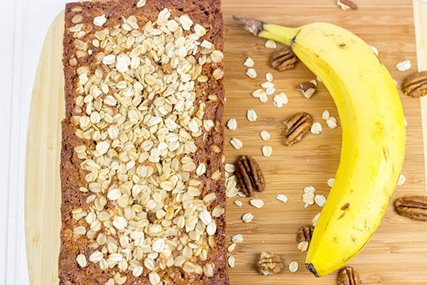 The addition of oats into this classic banana bread recipe yields a delicious Banana Oat Bread that will leave you begging for another slice!