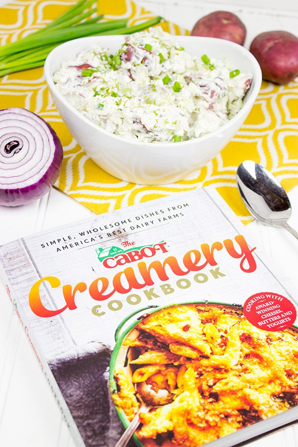 This lightened-up New England Potato Salad packs a flavor punch thanks to a handful of shredded horseradish cheddar cheese. It's a summer picnic classic!