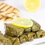 Filled with the flavors of lemon, dill and parsley, these Stuffed Grape Leaves are a fun way to enjoy classic Greek food at home!