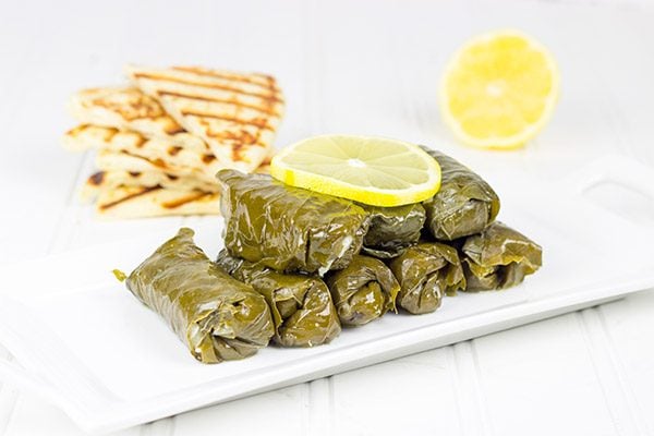 Filled with the flavors of lemon, dill and parsley, these Stuffed Grape Leaves are a fun way to enjoy classic Greek food at home! #EveryDayCare