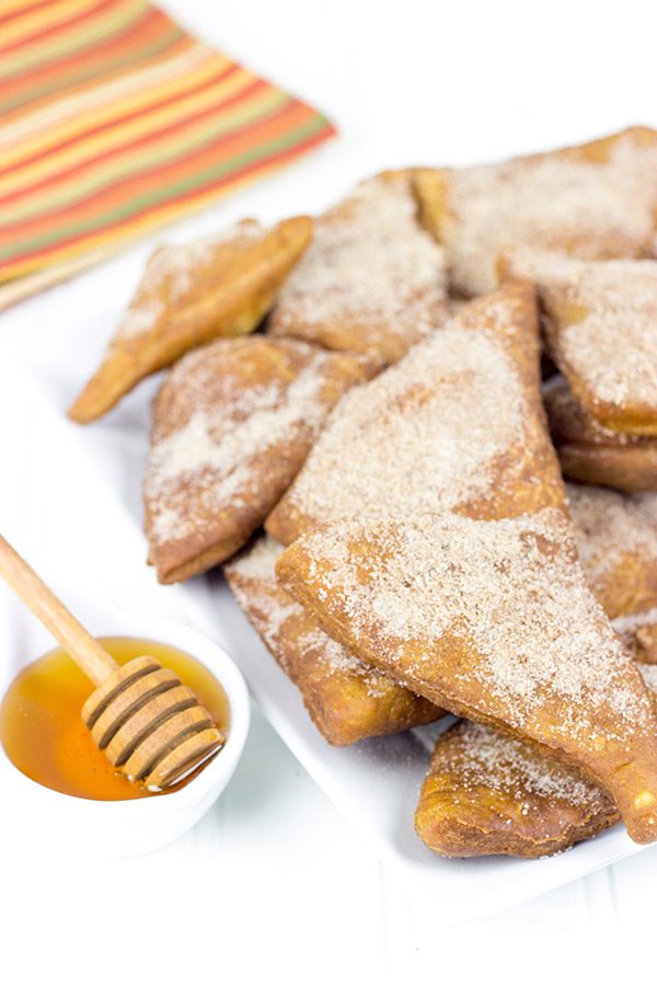 Dusted with cinnamon and sugar and served with honey, these Cinnamon Sugar Sopapillas are the perfect way to end a meal!
