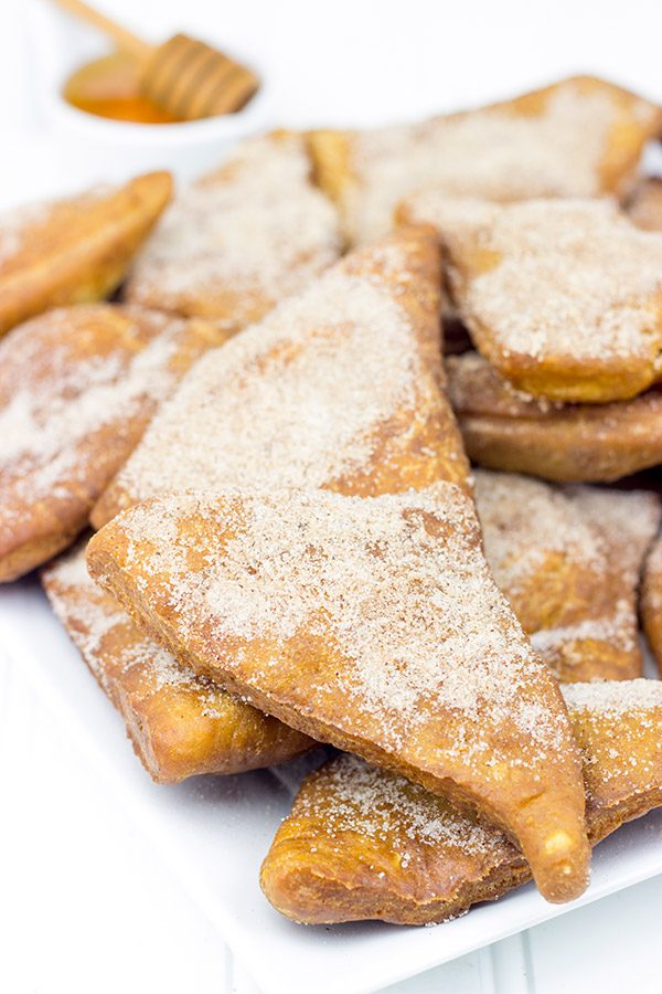 Dusted with cinnamon and sugar and served with honey, these Cinnamon Sugar Sopapillas are the perfect way to end a meal!