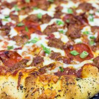 This Meat Lover's Pizza is loaded with cheese, sausage, bacon and pepperoni...and it's guaranteed to satisfy that pizza craving!