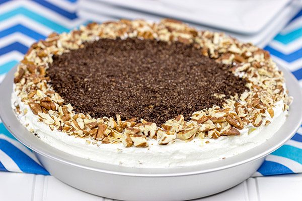 This Mocha Mississippi Mud Pie features a chocolate-pecan crust filled with a decadent mocha chocolate pudding. Add some whipped cream, and you've got the perfect summer dessert!