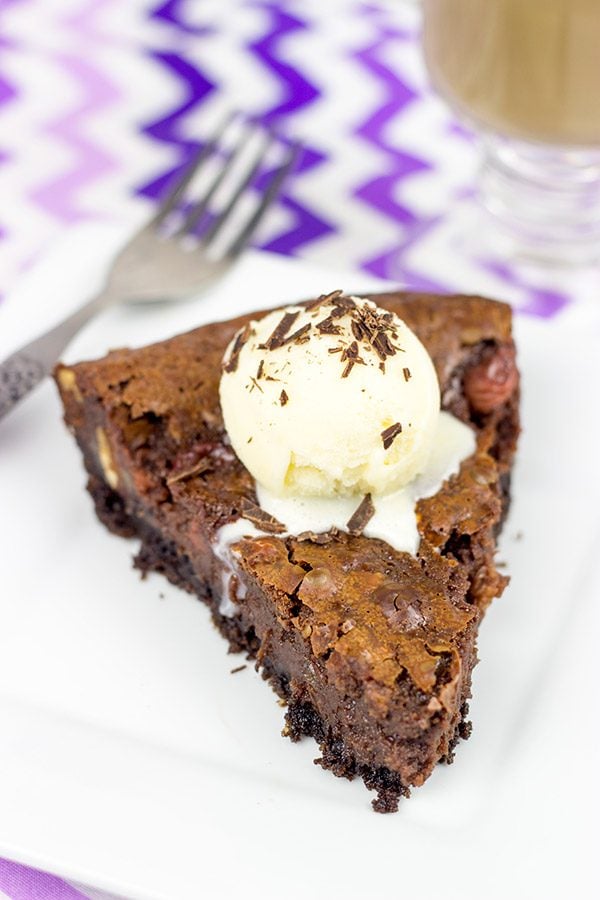This Black Forest Brownie Pie features a chocolate crust filled with a decadent chocolate and cherry brownie filling!