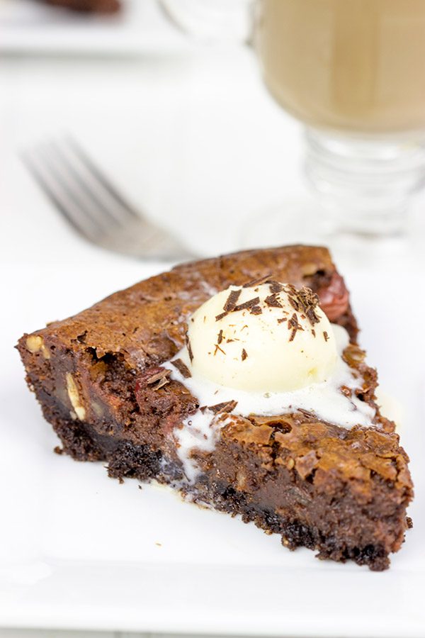 This Black Forest Brownie Pie features a chocolate crust filled with a decadent chocolate and cherry brownie filling!