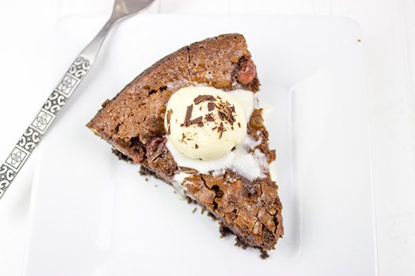 This Black Forest Brownie Pie features a chocolate crust filled with a decadent chocolate and cherry brownie filling!