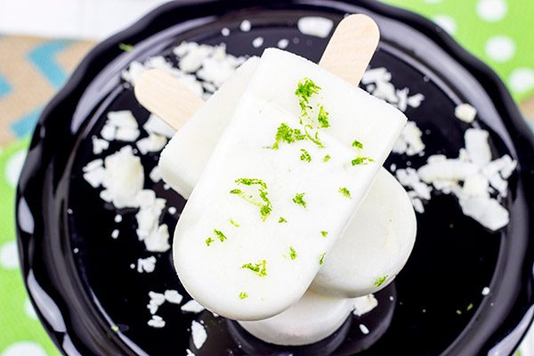 These tropical Coconut Lime Popsicles are a fun and refreshing snack on a hot summer afternoon!