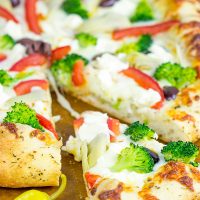 Topped with artichokes, olives and feta, this Greek Pizza is perfect for weekend pizza night!