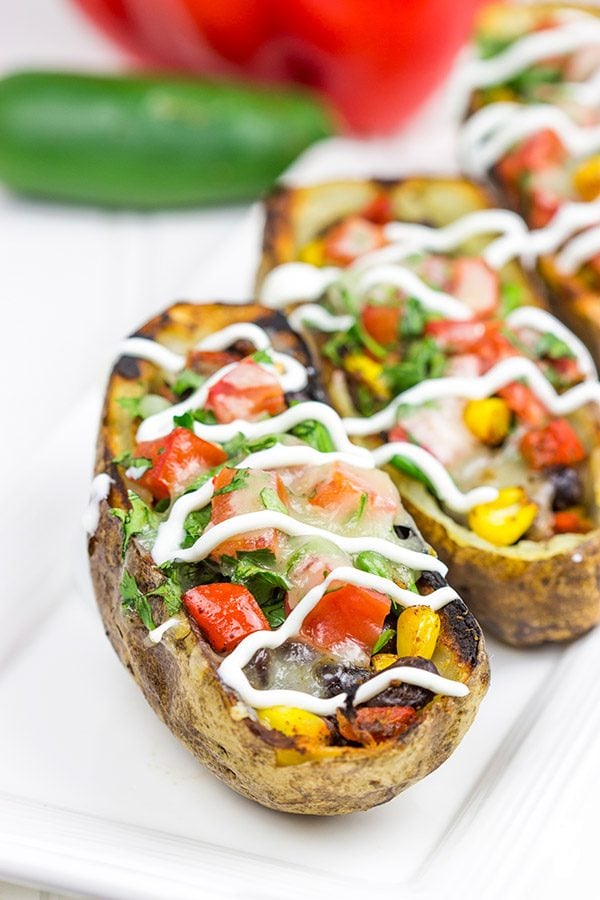 Loaded with layers of flavor, these Grilled Southwestern Potato Skins are one heck of a delicious summer appetizer!