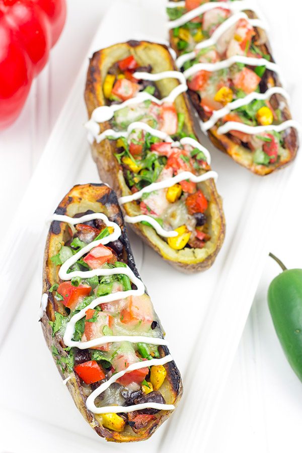 Loaded with layers of flavor, these Grilled Southwestern Potato Skins are one heck of a delicious summer appetizer!
