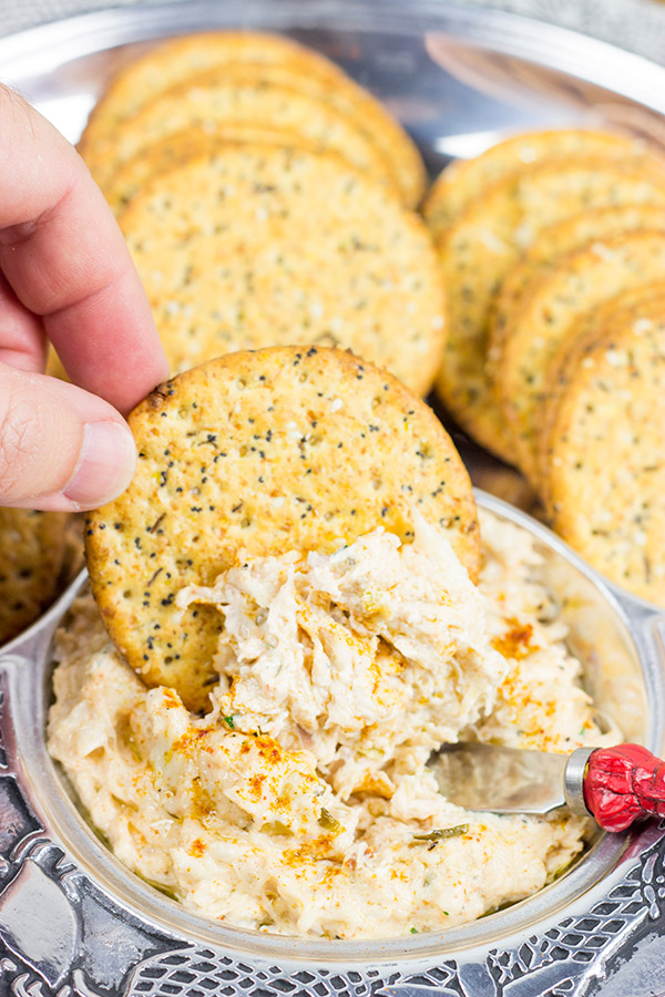 Just in time for tailgate season, this Hot Cajun Crab Dip will be the hit of the party!
